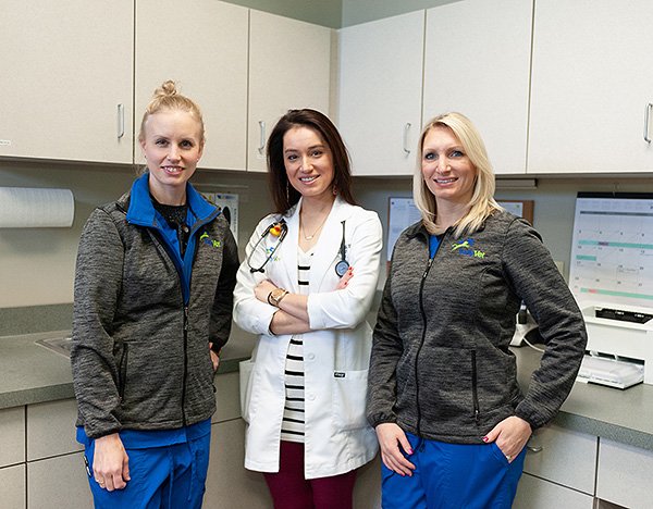 wood-support-6 Oncology team gathered together